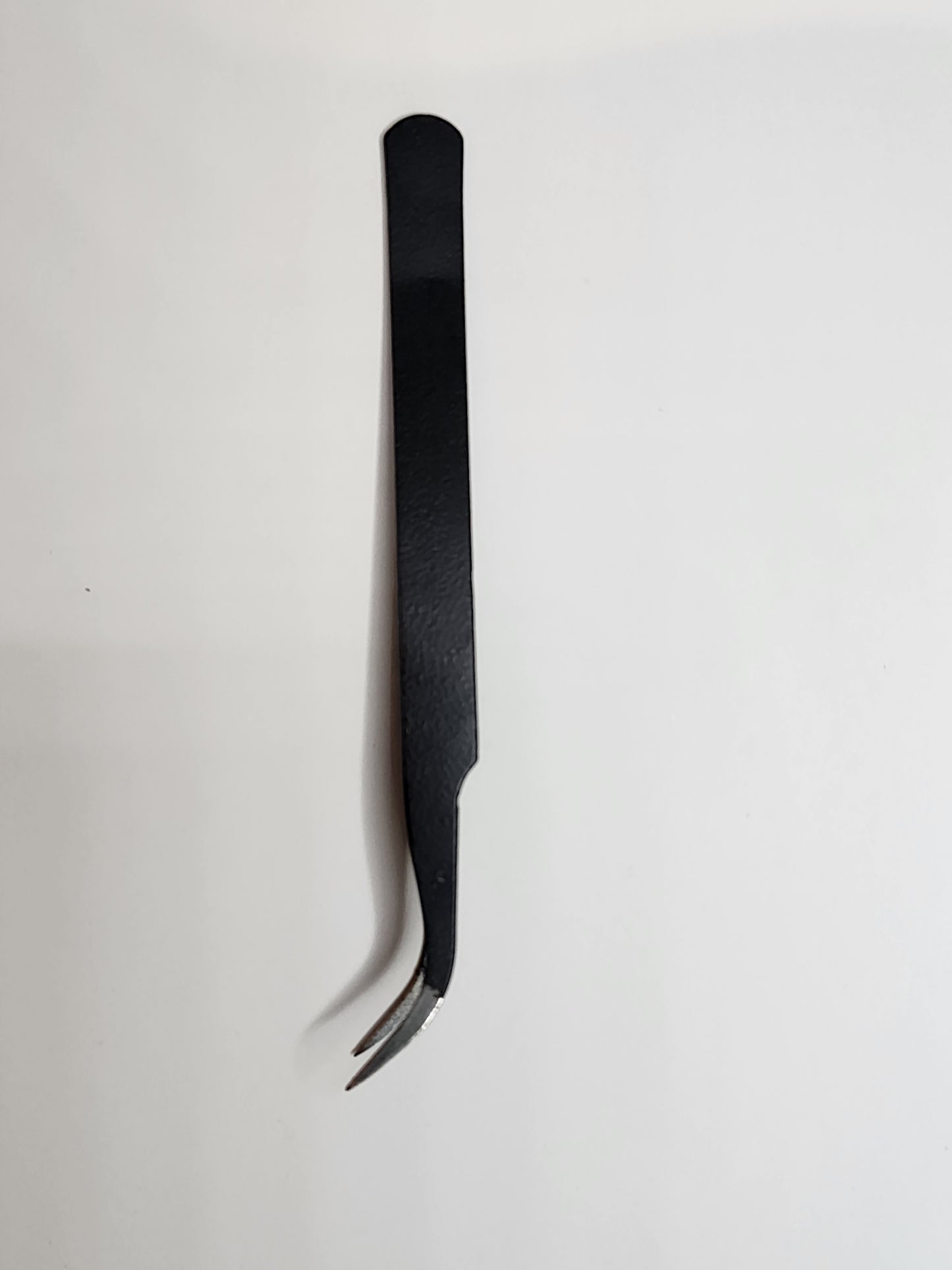 Black tweezers