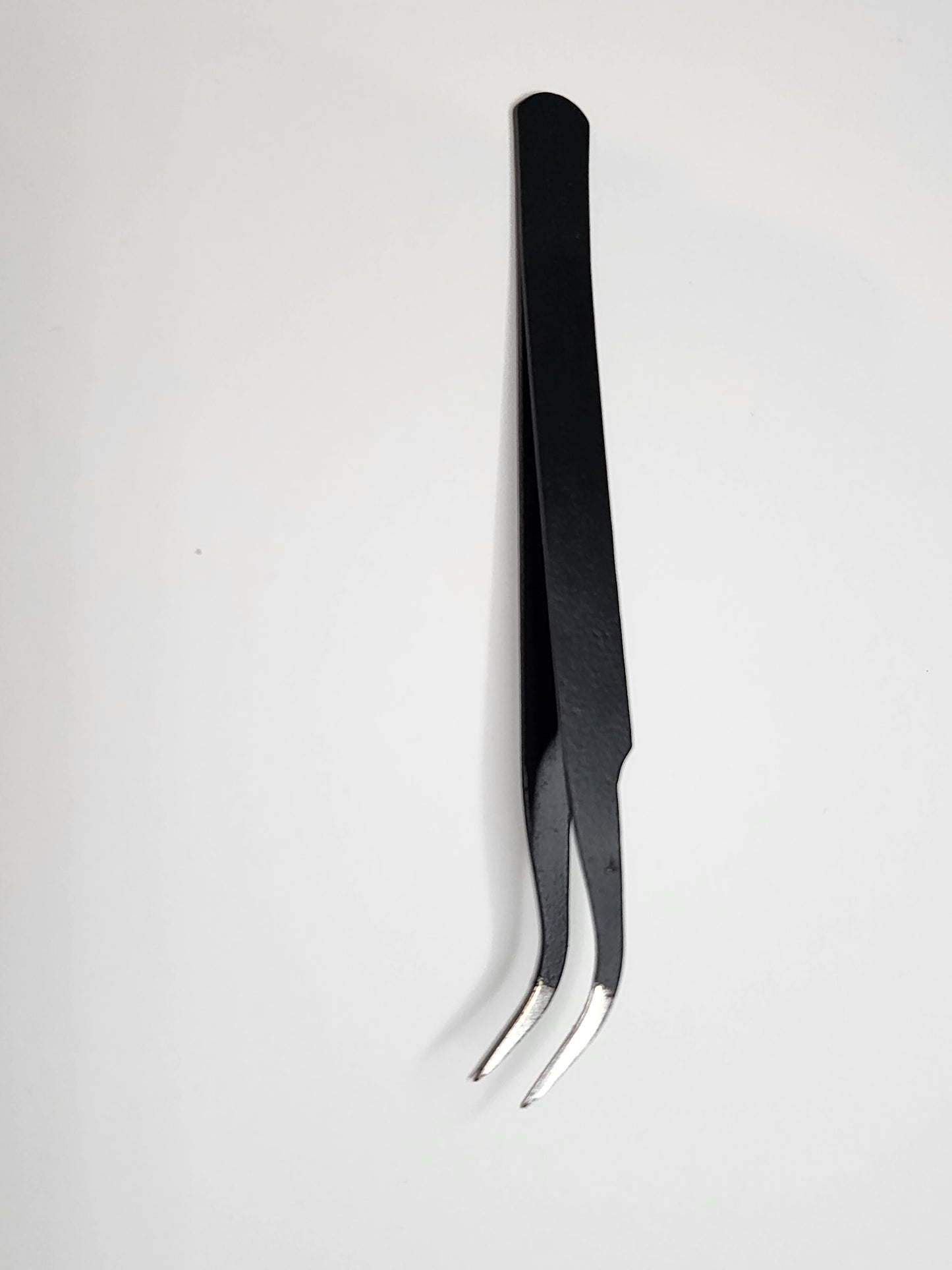 Black tweezers